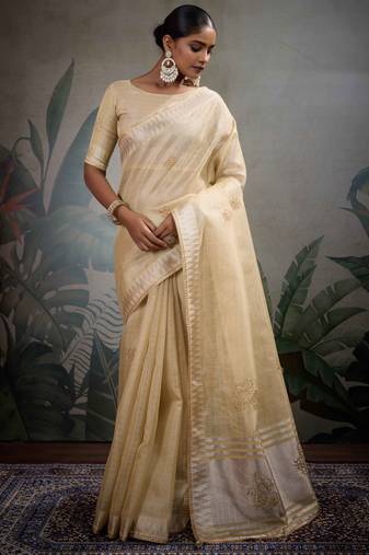 beige tissue linen handwork saree with unstitched blouse