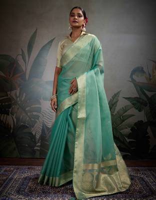 turquoise tissue zari woven saree with unstitched blouse 1