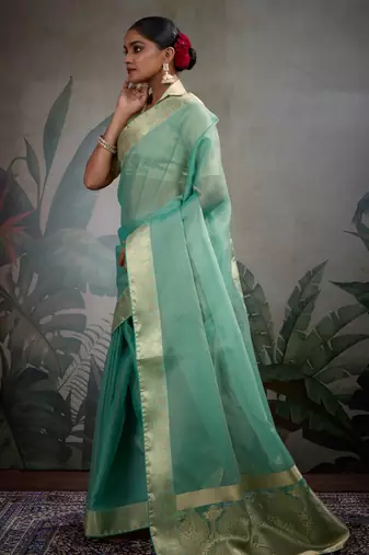 turquoise tissue zari woven saree with unstitched blouse