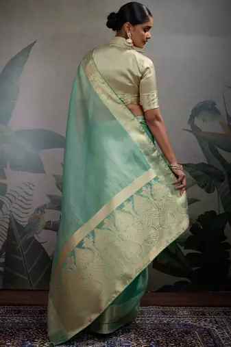 turquoise tissue zari woven saree with unstitched blouse