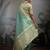 turquoise tissue zari woven saree with unstitched blouse