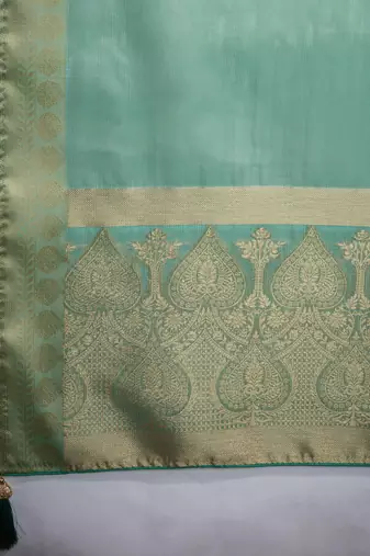 turquoise tissue zari woven saree with unstitched blouse