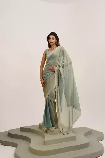 Metallic satin saree with beads embellishment and blouse