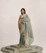 Metallic satin saree with beads embellishment and blouse
