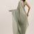 Metallic satin saree with beads embellishment and blouse