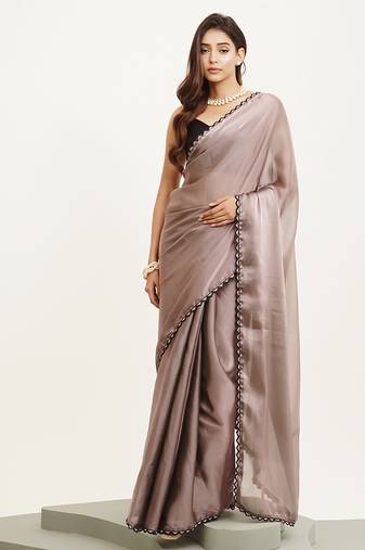 Metallic silk saree with beads & stones work and blouse
