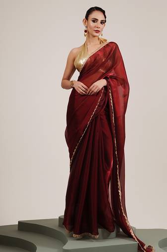 Maroon sequin organza saree with fancy work and  blouse