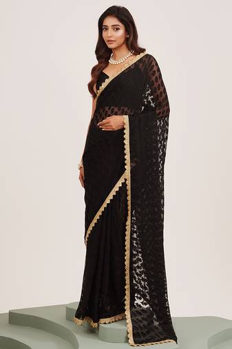 Black sequin brasso saree with fancy pallu and blouse