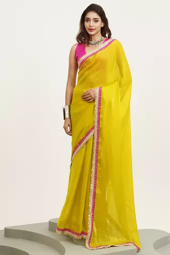 Metallic yellow sequin satin party saree with  blouse