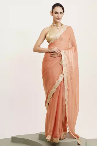 Peach satin saree with sequin work and  blouse