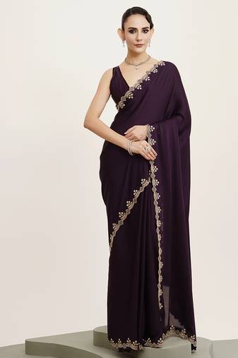 Purple satin saree with stone embellishment and blouse