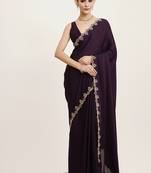 Purple satin saree with stone embellishment and blouse