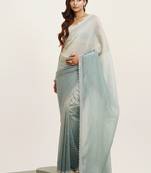 Turquoise blue tissue saree with beads work and blouse