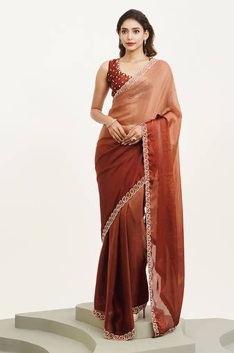 Rust satin saree with designer beads work and blouse