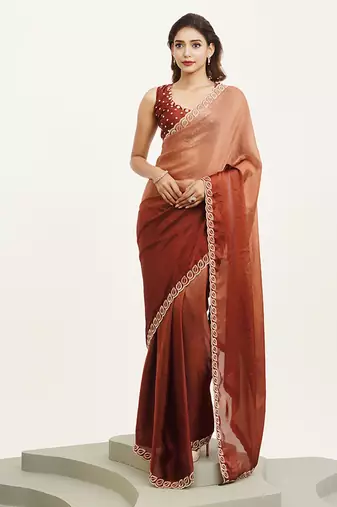 Rust satin saree with designer beads work and blouse