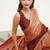 Rust satin saree with designer beads work and blouse