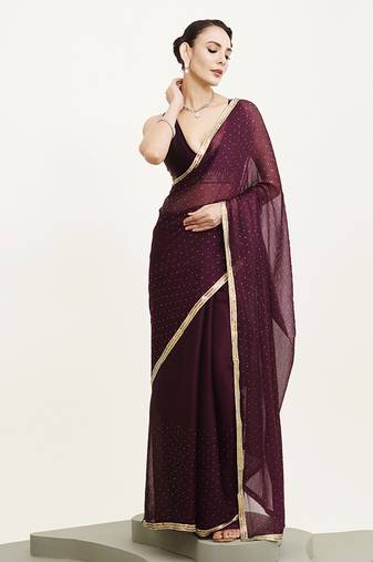 Purple chiffon saree with beads embellishment and blouse