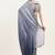 Blue satin saree with beads embellishment for events with blouse