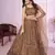 BROWN SEQUINS THREAD ZARI EMBROIDERED SOFT NET SEMI STITCHED LEHENGA CHOLI