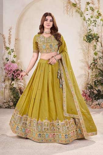 YELLOW SEQUINS THREAD EMBROIDERED GEORGETTE SEMI STITCHED LEHENGA