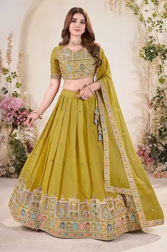 YELLOW SEQUINS THREAD EMBROIDERED GEORGETTE SEMI STITCHED LEHENGA