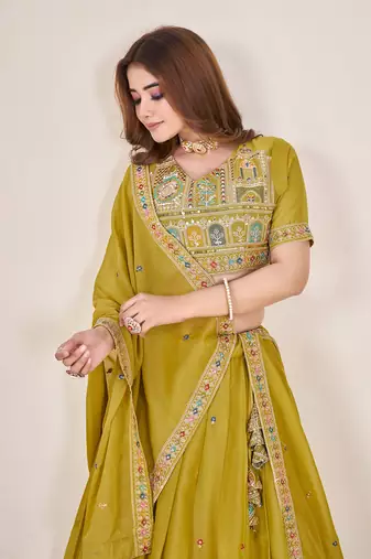 YELLOW SEQUINS THREAD EMBROIDERED GEORGETTE SEMI STITCHED LEHENGA