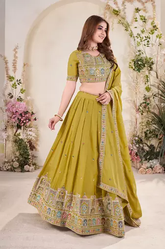 YELLOW SEQUINS THREAD EMBROIDERED GEORGETTE SEMI STITCHED LEHENGA