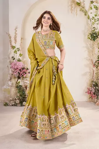 YELLOW SEQUINS THREAD EMBROIDERED GEORGETTE SEMI STITCHED LEHENGA