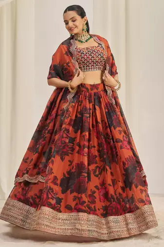 ORANGE ZARI SEQUINS EMBROIDEREY FLORAL PRINTED ORGANZA LEHENGA CHOLI