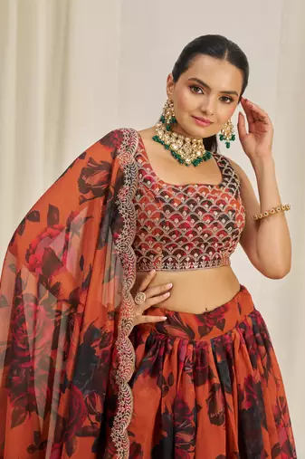 ORANGE ZARI SEQUINS EMBROIDEREY FLORAL PRINTED ORGANZA LEHENGA CHOLI
