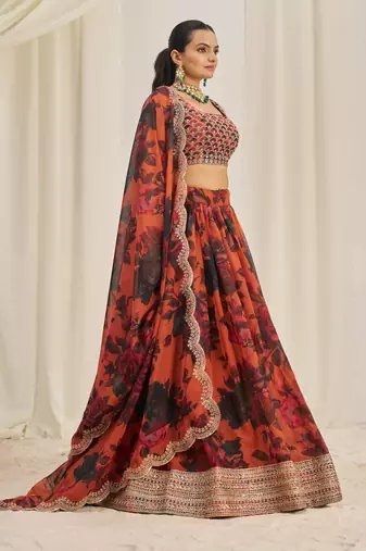 ORANGE ZARI SEQUINS EMBROIDEREY FLORAL PRINTED ORGANZA LEHENGA CHOLI