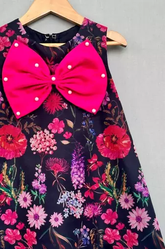 Floral aline dress with hot pink bow