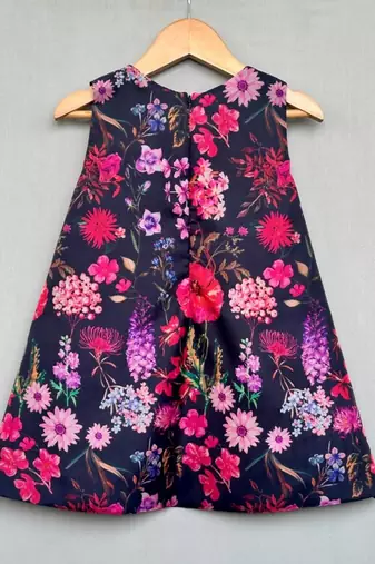 Floral aline dress with hot pink bow