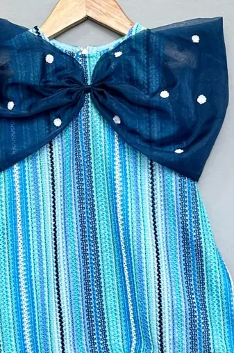 Knitted striped dress with big organza bow