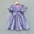 Metallic purple pleated party dress with oversized bow