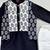 Black kurta with printed attached jacket and pant