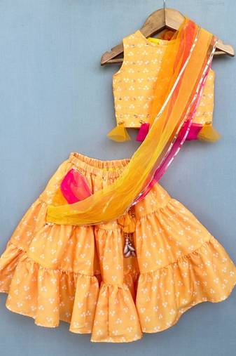 Yellow bandhni lehenga set with attached dupatta