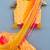 Yellow bandhni lehenga set with attached dupatta