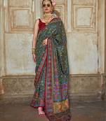 Dark green silk blend printed saree with unstitched blouse