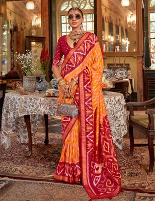 Orange silk blend printed saree with unstitched blouse 1