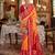 Orange silk blend printed saree with unstitched blouse