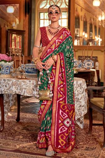 Dark green silk blend printed saree with unstitched blouse