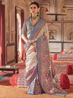 Beige silk blend printed saree with unstitched blouse 1