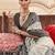 White silk blend printed saree with unstitched blouse