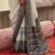 White silk blend printed saree with unstitched blouse