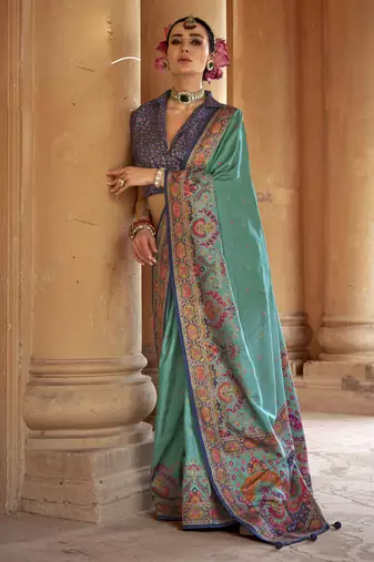 Turquoise silk blend printed saree with unstitched blouse piece