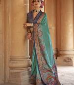 Turquoise silk blend printed saree with unstitched blouse