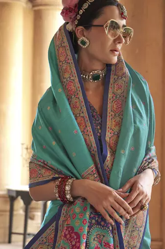 Turquoise silk blend printed saree with unstitched blouse