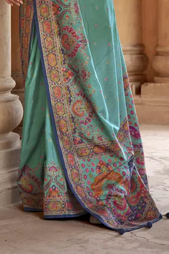 Turquoise silk blend printed saree with unstitched blouse