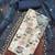 Off white cotton embroidered unstitched dressaterial